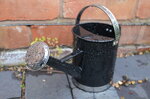 raindrops-on-a-watering-can_9164858889_o.jpg